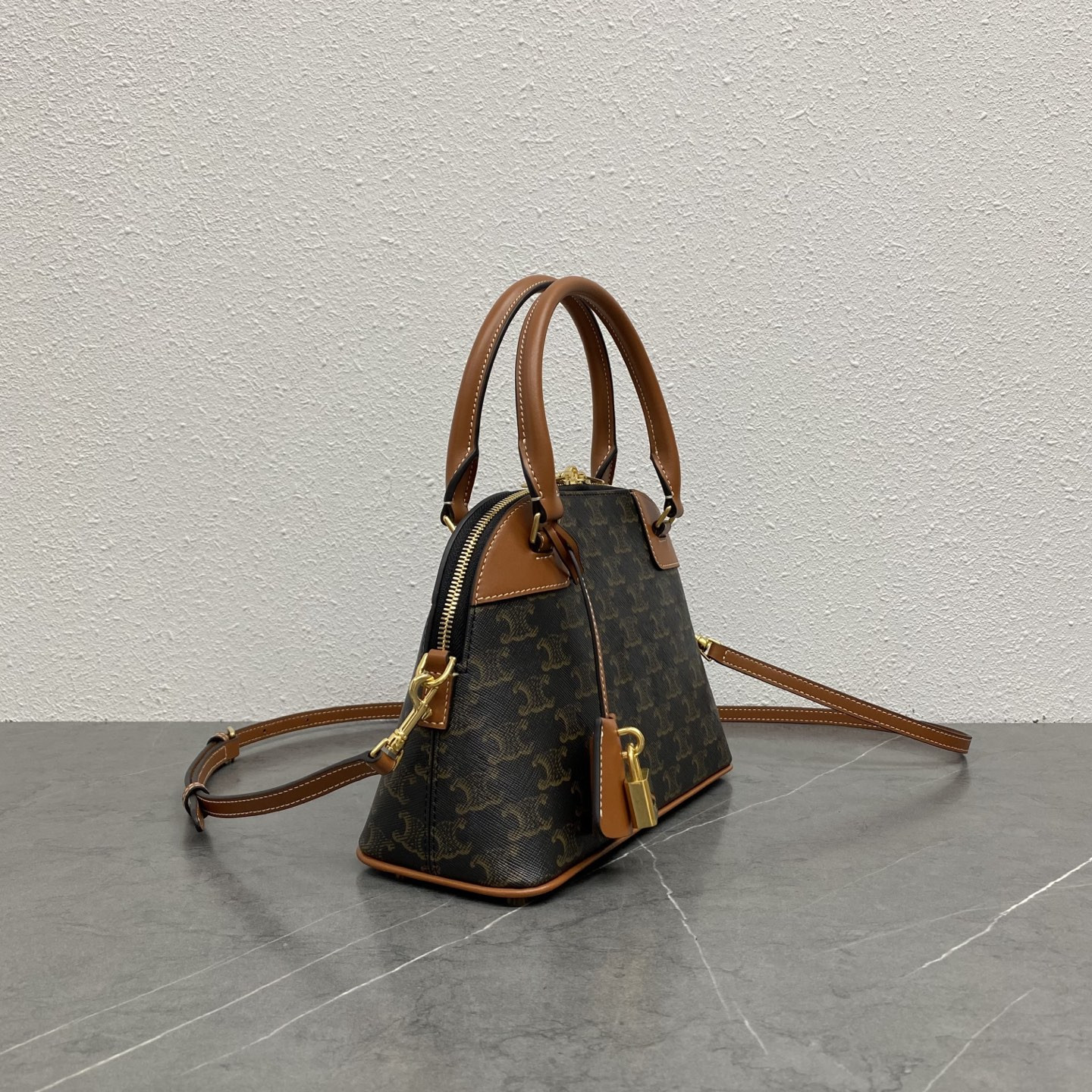 Ce**e small bowling in triomphe canvas and calfskin 25x17x10cm